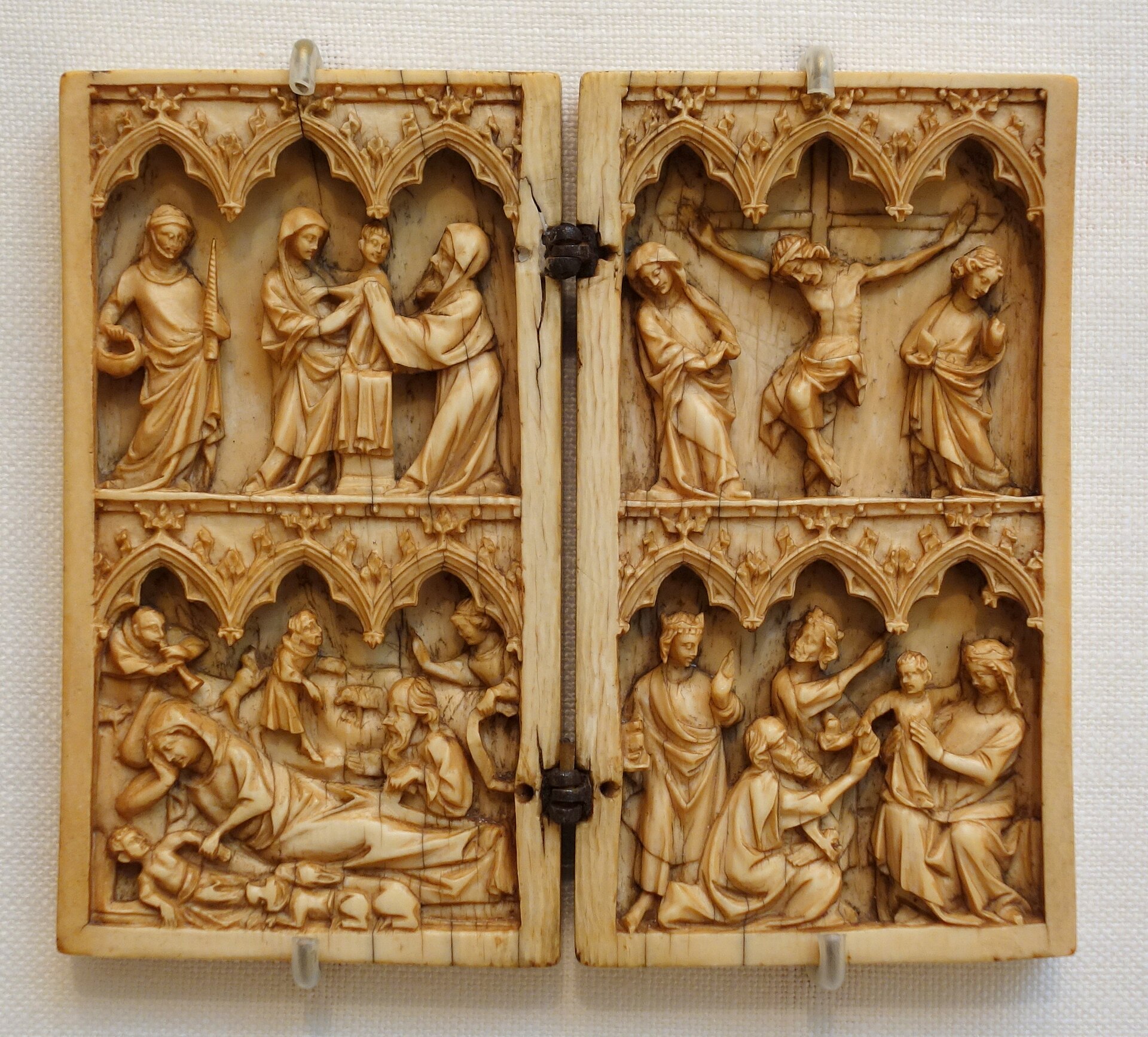 A carved ivory diptych from 14th-century France