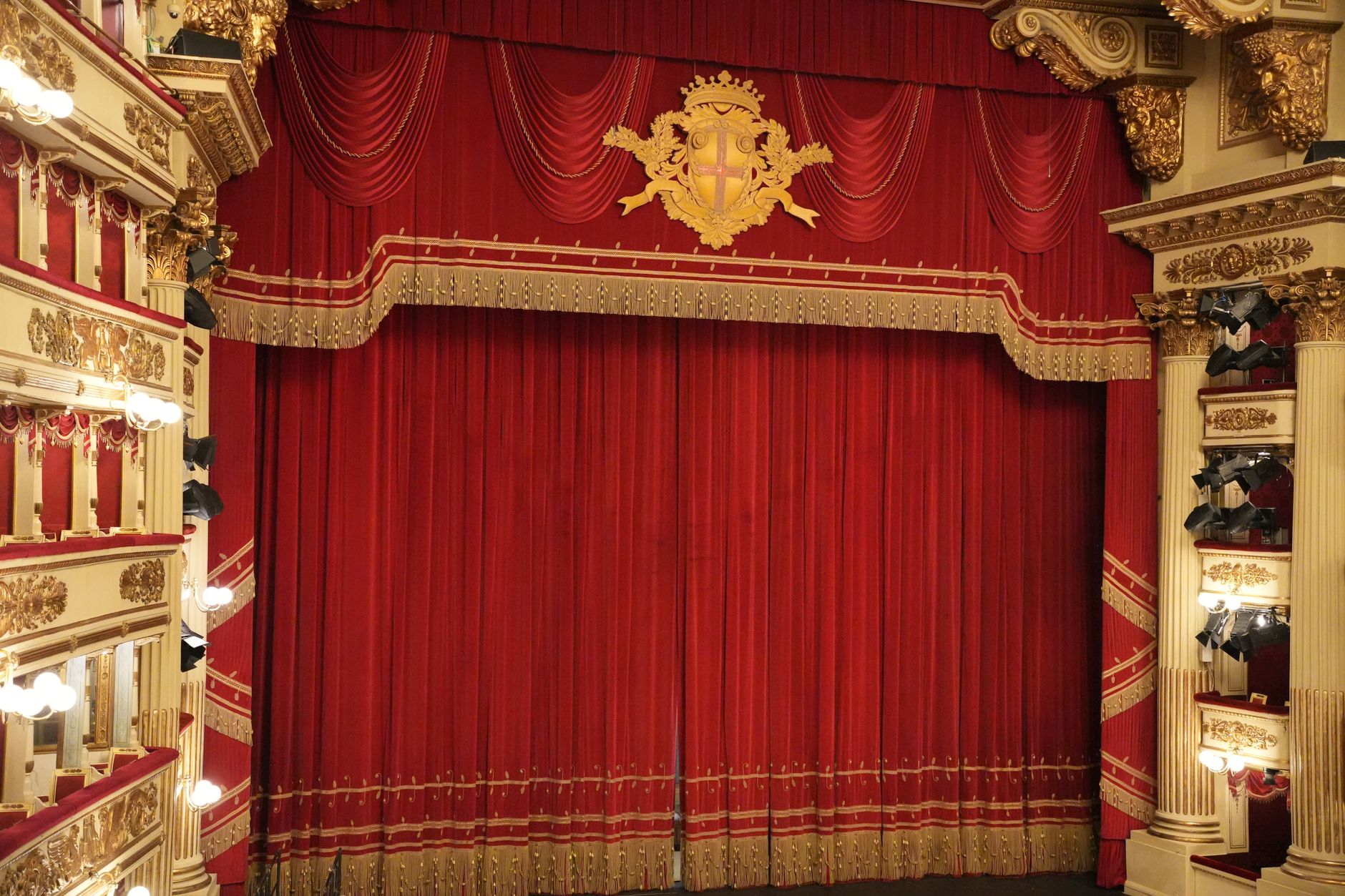 A red curtain in an opera house